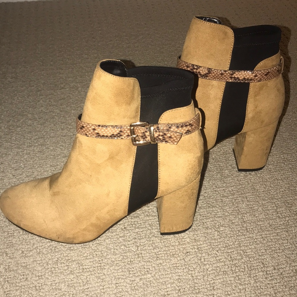 Tan booties with snake skin accent buckle!